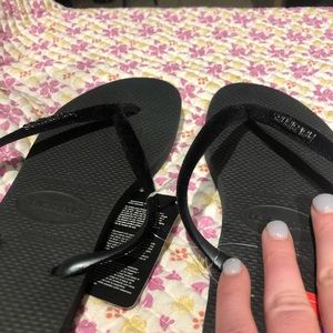 Havaianas black flip flops